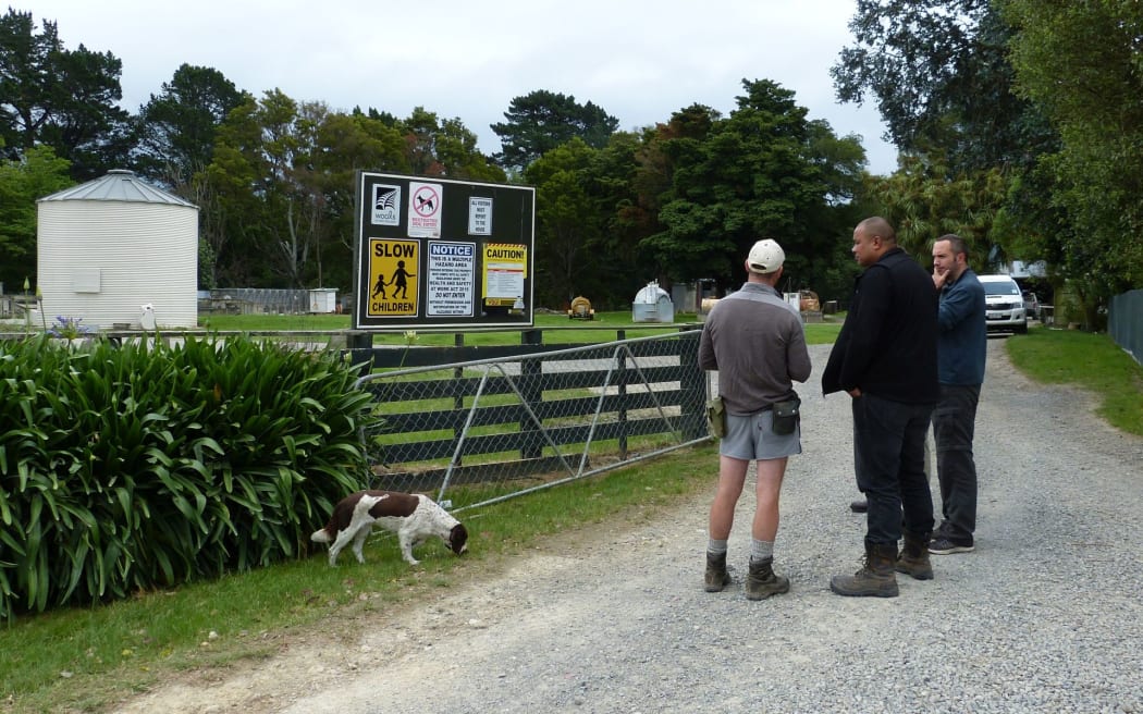 Beef and dairy farmer George Tatham and Sam Koronui discuss hazards with Sam Halstead.
