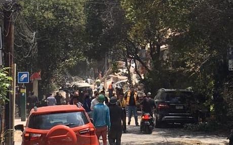 Jai Krishnan took this photo of people next to the rubble of a building in Mexico City.