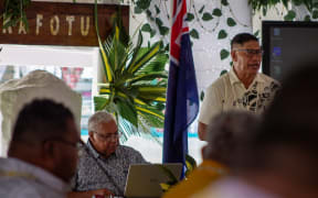 Aukusitino Vitale speaking at General Fono on fakaofo in March 2025.