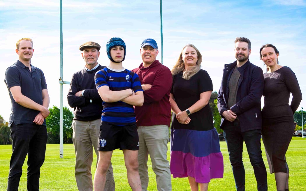 The Ruru headgear development team includes (from left) Dr George Stilwell, Emeritus Professor Keith Alexander, Professor Nick Draper, Annette Swale (PhD student), Dr Simon Blue and Dr Natalia Kabaliuk. Joe Draper (front) is wearing the prototype.
