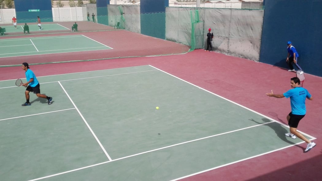 Doubles pairing Brett Baudinet from the Cook Islands and Guam's Daniel Llarenas competing in the Davis Cup tie in Bahrain.