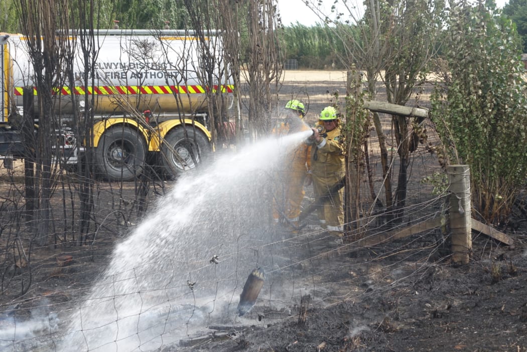 Firefighters and four helicopters brought the fire under control on Monday.