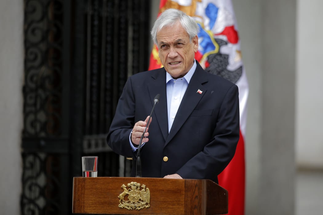Chilean President Sebastian Pinera addresses the nation in Santiago on 26 October.