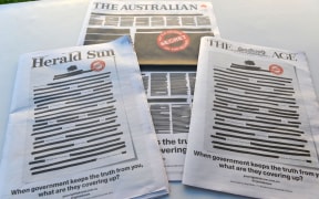 The front pages of The Australian, Herald Sun and The Age newspapers were blacked out on Oct 21 as part of a protest against media restrictions.
