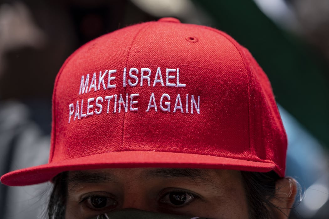 Thousands gather in front of the Consulate General of Israel in Los Angeles, CA to protest in solidarity with Palestinians on strike in Israel, the West Bank, and the Gaza Strip.