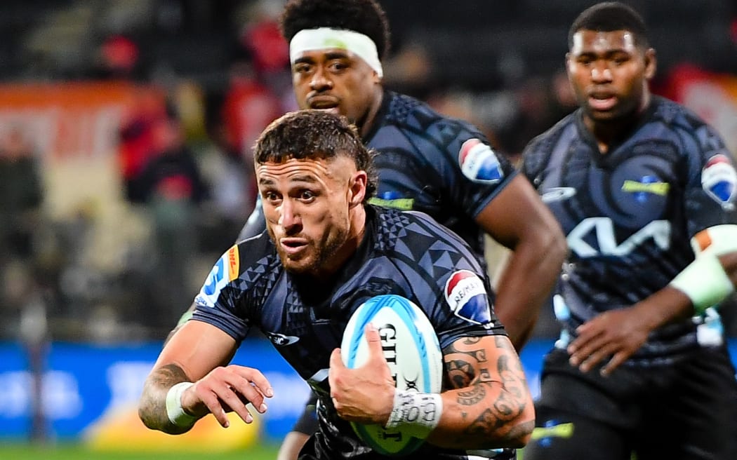 TJ Perenara playing for the Hurricanes.