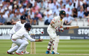 Gary Ballance fields off the batting of Chris Rogers during the second Ashes Test between England and Australia at Lord's