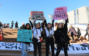 From left, Yizney Morale, Yibeth Morales, Cerys Evans and Manawa McLeod at the Black Lives Matter protest in Wellington.