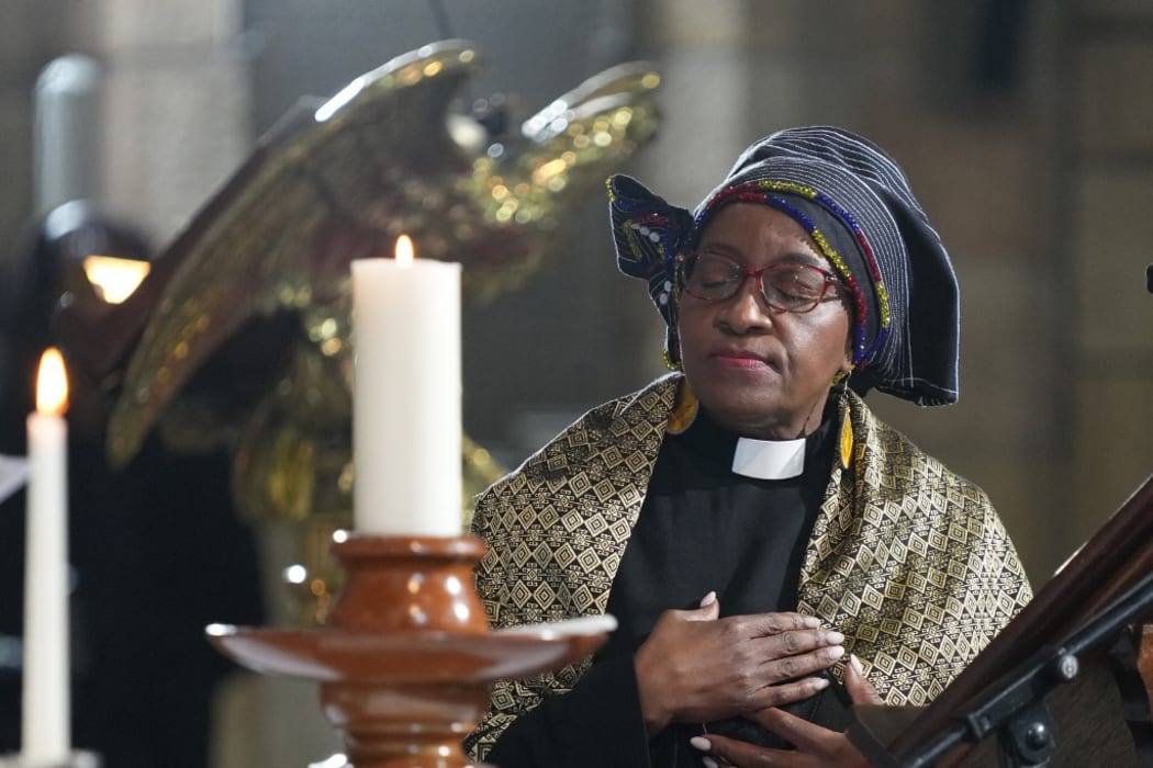 Mpho Tutu van Furth, daughter of South African anti-Apartheid icon Archbishop Desmond Tutu, takes a moment during the requiem mass of Tutu at St. Georges Cathedral in Cape Town on January 1, 2022.