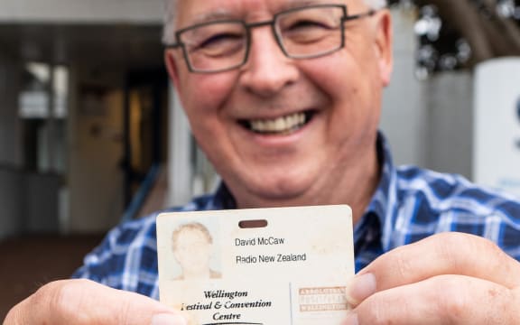 RNZ Concert senior music producer David McCaw with ID card which he lost in 2003. It was found by NIWA diver Rod Budd in Antarctica in 2016.