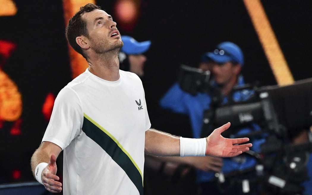 Britain's Andy Murray celebrates victory against Italy's Matteo Berrettini during their men's singles match on day two of the Australian Open tennis tournament in Melbourne on January 17, 2023. (Photo by Paul CROCK / AFP) / -- IMAGE RESTRICTED TO EDITORIAL USE - STRICTLY NO COMMERCIAL USE --