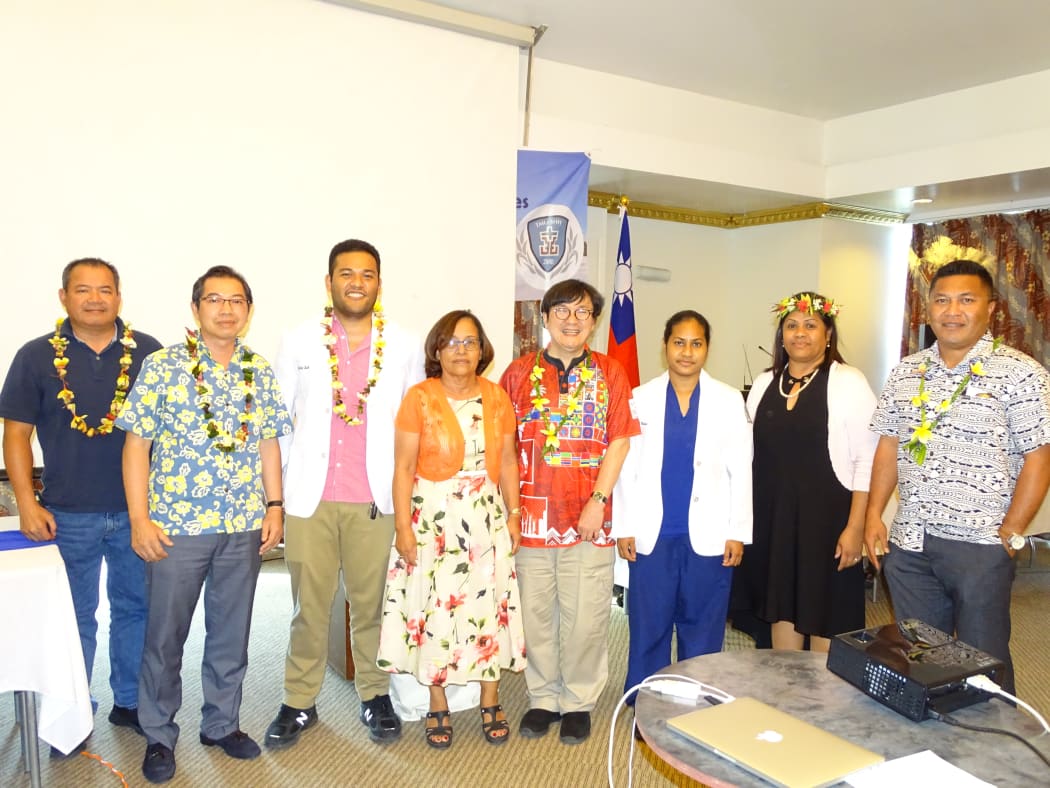 Marshall Islands President Hilda Heine, fourth from left, and Taiwan Ambassador Jeffery Hsiao, second from left, joined Ministry of Health staff and newly graduated doctors from Taiwan's I-Shou Medical University at a recent recognition event in Majuro