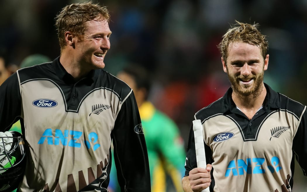 Martin Guptill and Kane Williamson after setting the world record for the highest partnership in T20i cricket.