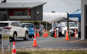 Cars line up as people wait to be tested for Covid-19 at the Orchard Road drive-through testing centre in Christchurch