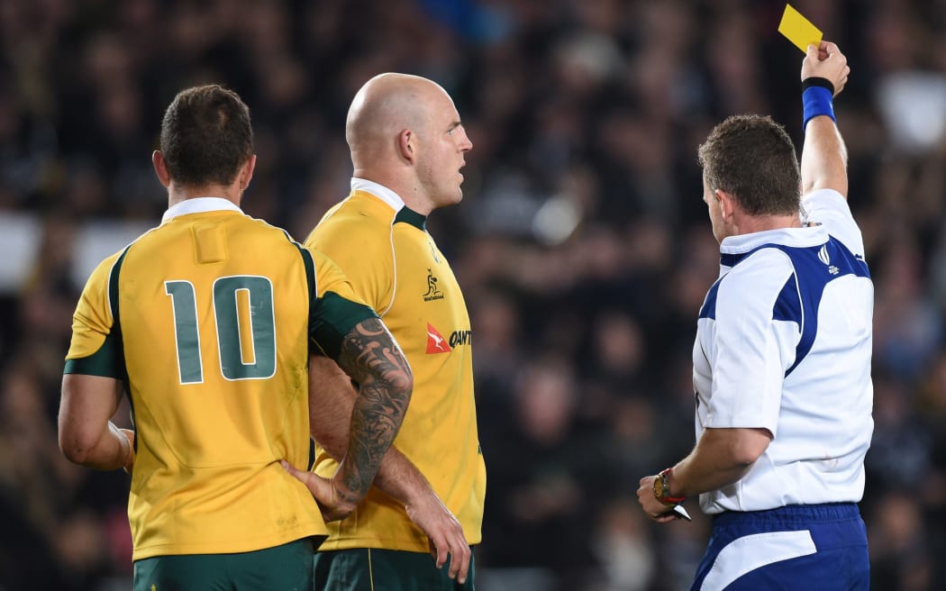 Referee Nigel Owens gives Quade Cooper a yellow card, Auckland, 2015.