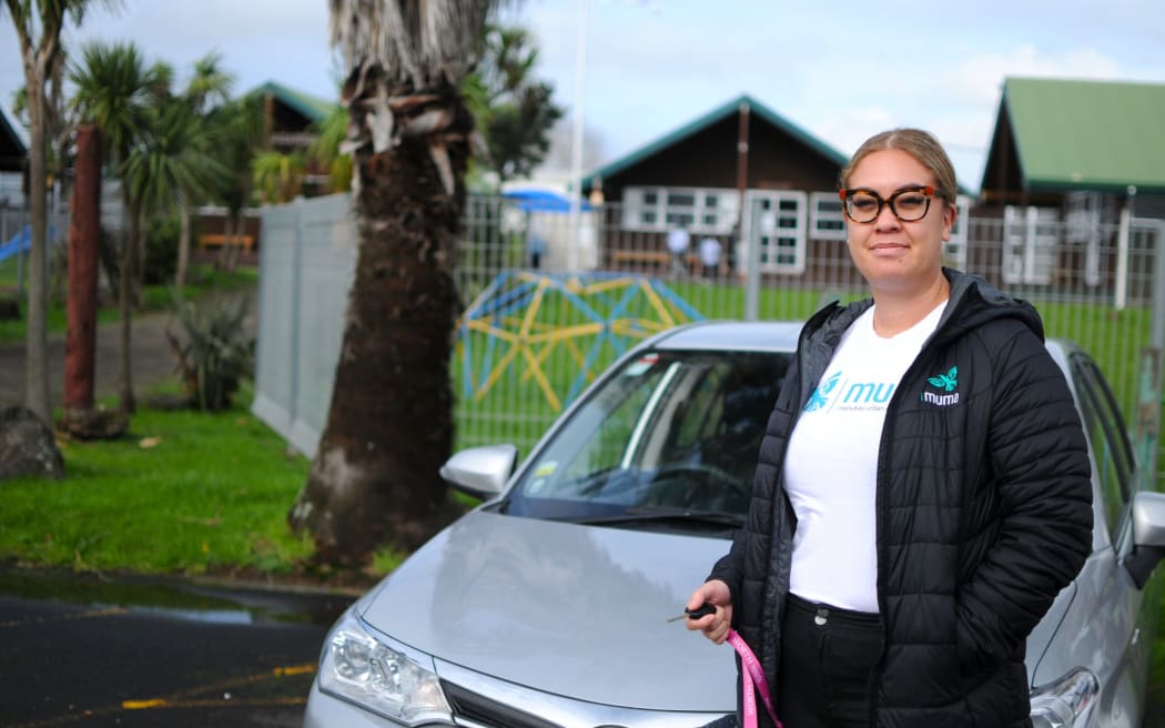 Weymouth resident Bobbi-Lee Edwards with the car she is leasing as part of the Manukau Urban Māori Authority’s (MUMA) Waka Aronui scheme.