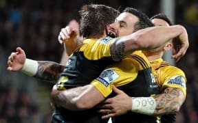 The Hurricanes celebrate a try.