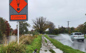 Flooding down River Road by Banks Avenue in Christchurch.