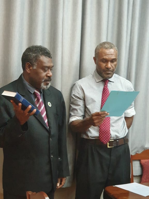 Vanuatu MP Bruno Leingkon being sworn in as the country's Climate Change minister.