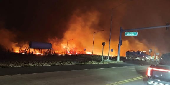 In this image obtained from the County of Maui in Hawaii, shows a wildfire in Lahaina, on 9 August, 2023. Hawaii wildfires fanned by winds from Hurricane Dora forced evacuation late on 8 August.