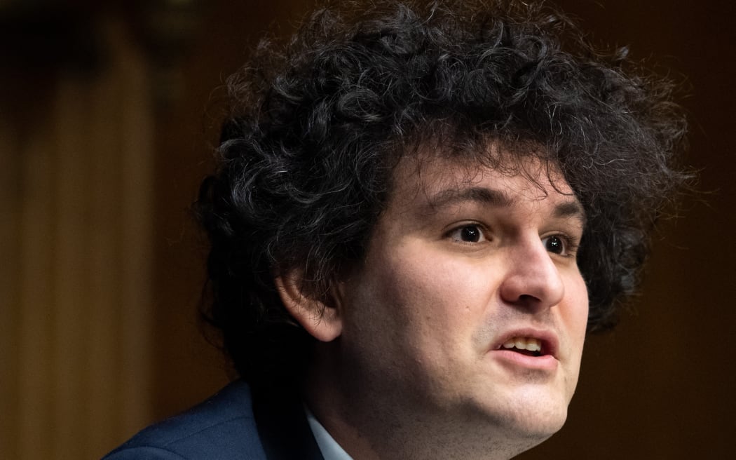 (FILES) In this file photo taken on February 09, 2022, Samuel Bankman-Fried, founder and CEO of FTX, testifies during a Senate Committee on Agriculture, Nutrition and Forestry hearing about "Examining Digital Assets: Risks, Regulation, and Innovation," on Capitol Hill in Washington, DC. - Crisis-struck cryptocurrency platform FTX has gone bankrupt in the USs and its CEO Sam Bankman-Fried has resigned, it said on November 11, 2022, the latest blow in a saga that has reverberated across the digital currency landscape. FTX Group announced in a statement Friday that it filed for Chapter 11 bankruptcy proceedings, adding it has begun an "orderly process to review and monetize assets for the benefit of all global stakeholders." (Photo by SAUL LOEB / AFP)