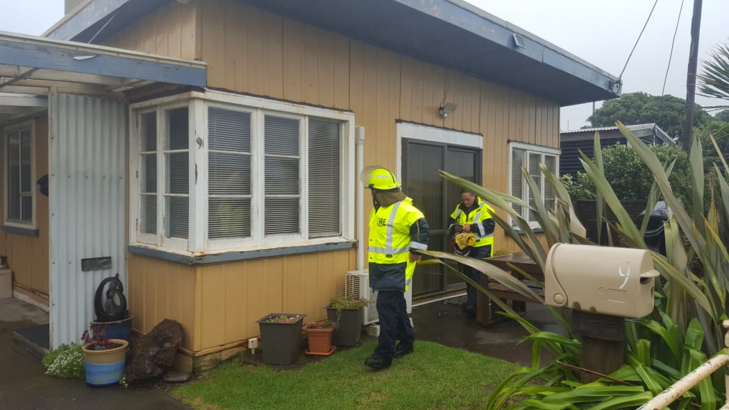 Fire and emergency staff went door to door.