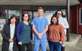 Nelson dentist Dr Jacob Linn with the translators who worked on the refugee project with him.