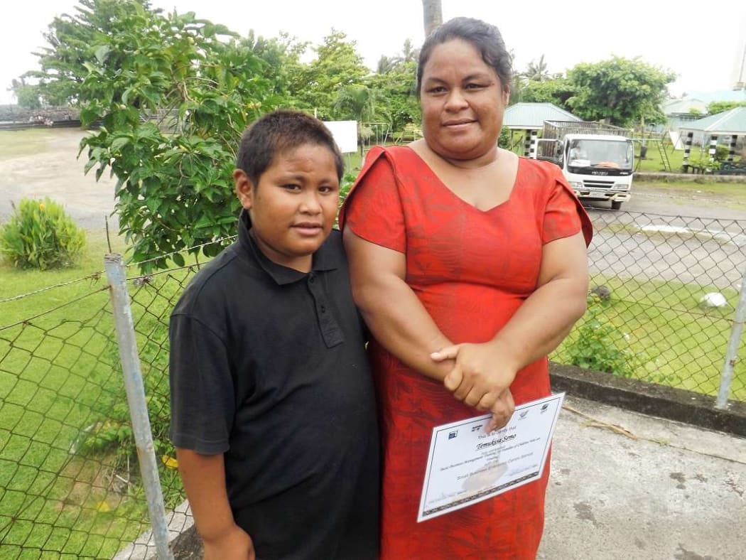 Temukisa Semau  and her son from Leone a sub village of Apia.