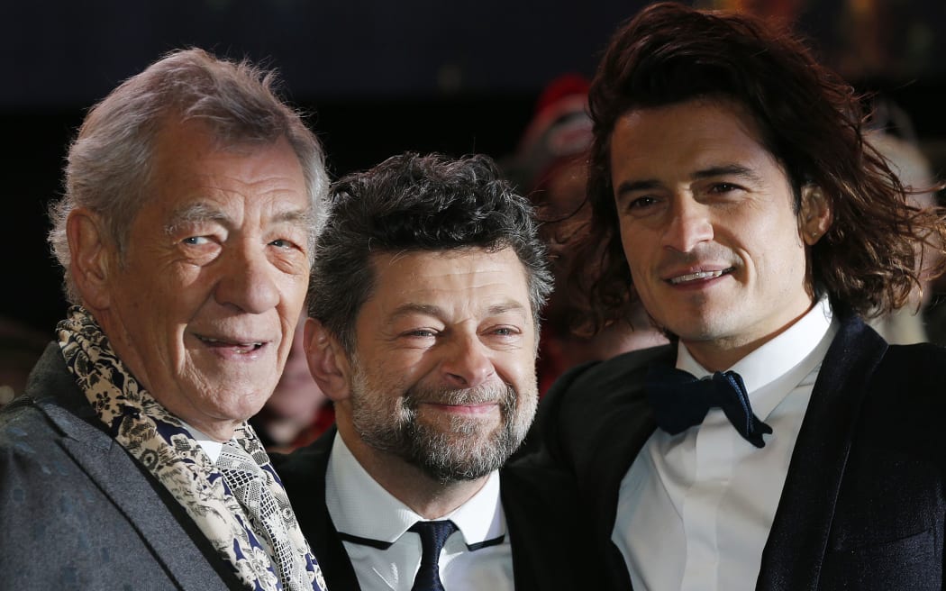 Cast members Ian McKellen (left) and Orlando Bloom with second unit director Andy Serkis (centre) arriving at the world premiere of "The Hobbit.