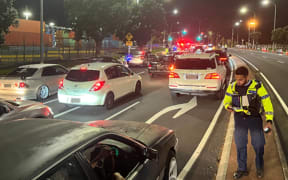 Officers carry out Operation Tread on Auckland's Quay Street, April 2024.