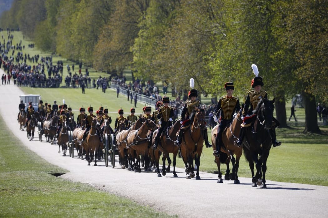 Members of the King's Troop Royal Horse Artillery ride up the Long Walk to Windsor Castle before Prince Philip's funeral service.