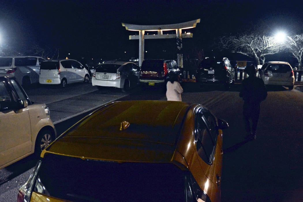 People evacuate to Hiyoriyama mountain in Ishinomaki City, Miyagi prefecture on 17 March 2022 after a powerfule 7.3 earthquake jolted Japan's northeastern coast.