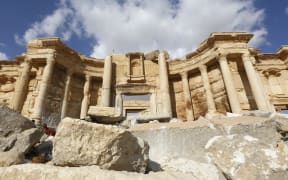The damaged Roman amphitheatre in the ancient city of Palmyra in central Syria.
