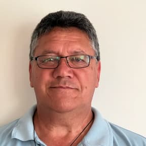 Head and shoulders photo of David Tapene