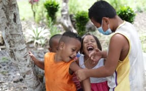 Meanwhile the village kids are getting the message about vaccination. Face masks are a common sight in Samoa.
