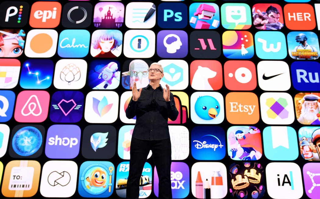 This handout image obtained June 7, 2021 courtesy of Apple Inc. shows Apple CEO Tim Cook spotlights the dynamic community of App Store developers across the globe at Apple's Worldwide Developers Conference at Apple Park in Cupertino, California. -