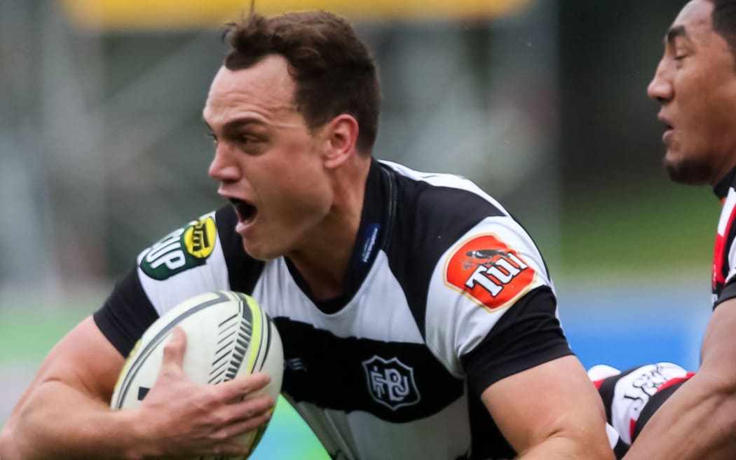 Israel Dagg tries to bust the tackle of Bundee Aki.
