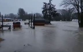 Water pouring through Omarama Top 10 Holiday Park on Tuesday 19 July 2022.