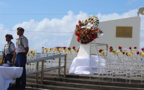 Three-four empty decorated chairs at the base of the Veterans Memorial Monument during Saturday’s government sponsored tsunami memorial service marking the 10th anniversary of the September 2009 tsunami which claimed the lives of 34 people in American Samoa.