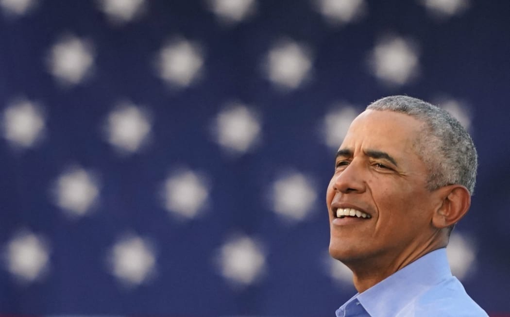 Former US President Barack Obama addresses Biden-Harris supporters during a drive-in rally in Philadelphia, Pennsylvania on October 21, 2020. -