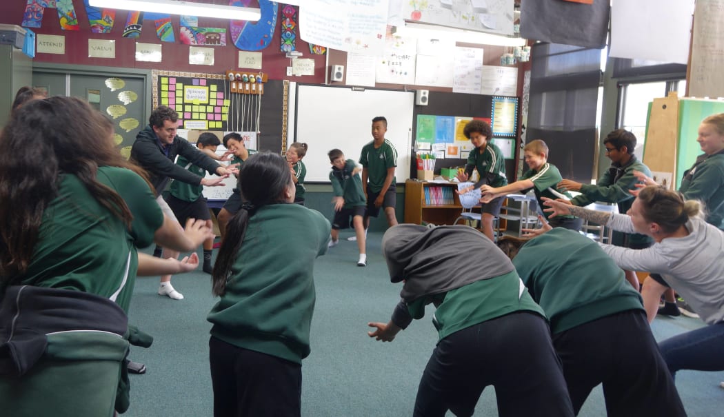 Room 1 students from Avalon Intermediate demonstrate the Dragonball Z, their favourite yoga pose.