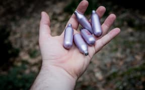 Nitrous oxide cartridges.