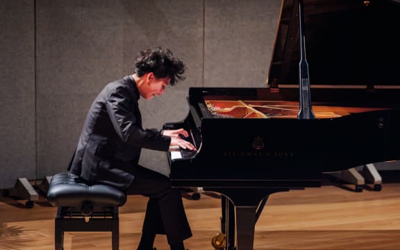 Shan Liu, winner of the 2023 Lewis Eady National Junior Piano Competition, in action at the piano.