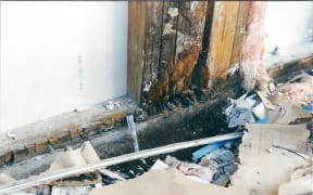 Rotten wood in a leaky building