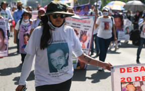 Mothers of the disappeared, take part during a demonstration to demand to authorities the location of their children. Mothers join in the protest to to ask for support to continue looking for their relatives throughout the country. On May 10, 2022 in Mexico City, Mexico.  (Photo by Amaresh Narro/Eyepix/NurPhoto) (Photo by Eyepix / NurPhoto / NurPhoto via AFP)