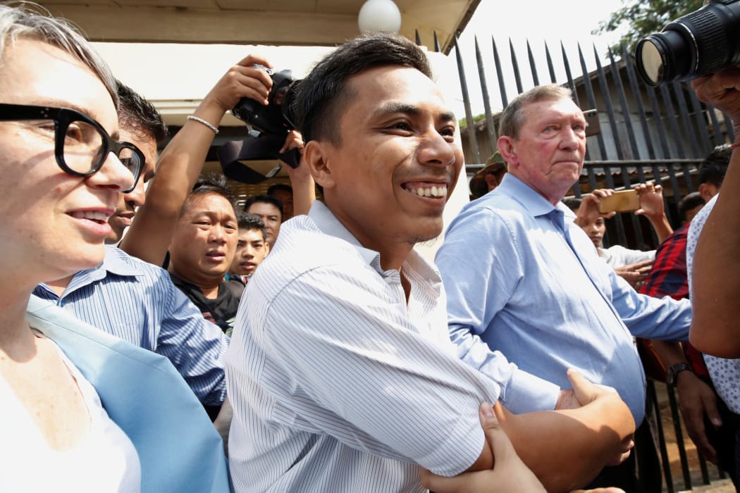 Reuters journalist Kyaw Soe Oo reacts after being freed from Insein prison with colleague Wa Lone in a presidential amnesty in Yangon on May 7, 2019.