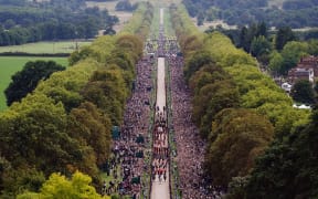 The Ceremonial Procession of the coffin of Queen Elizabeth II travels down the Long Walk as it arrives at Windsor Castle for the Committal Service at St George's Chapel, on September 19, 2022.