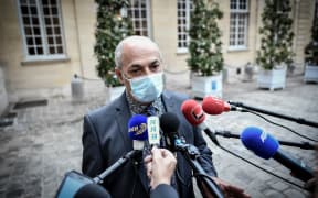 New Caledonia's delegate Gilbert Tyuienon from "Union caledonienne" political group speaks to journalists following a meeting with French Prime Minister, on May 26, 2021 at the Hotel de Matignon, in Paris. (Photo by STEPHANE DE SAKUTIN / AFP)