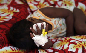 A child with measles at Poutasi District Hospital.