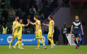 Alex Rufer of the Phoenix and his teammates react at the final whistle. Melbourne Victory FC v Wellington Phoenix FC.